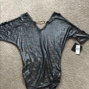 Black shimmering top with arm cut outs